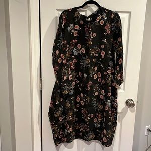 Loose fitting cotton long sleeve dress.